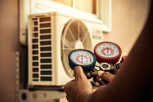 Professional Ductwork Repair technician working in Zavalla, TX